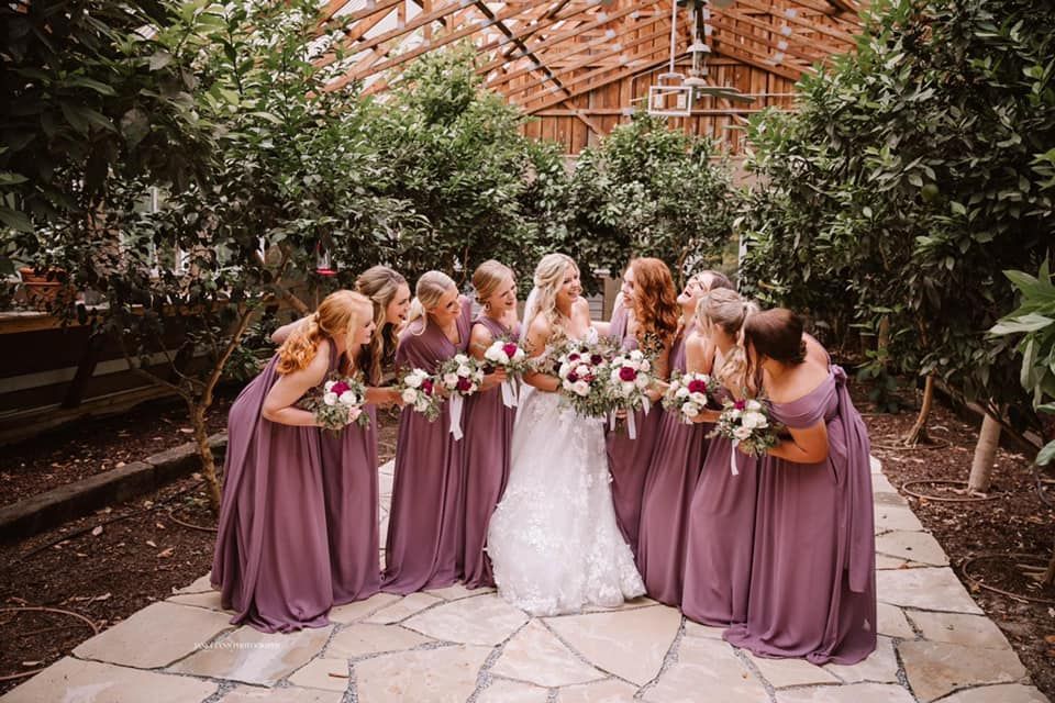 Bridal party in Greenhousesandy creek farms springville tn wedding venue